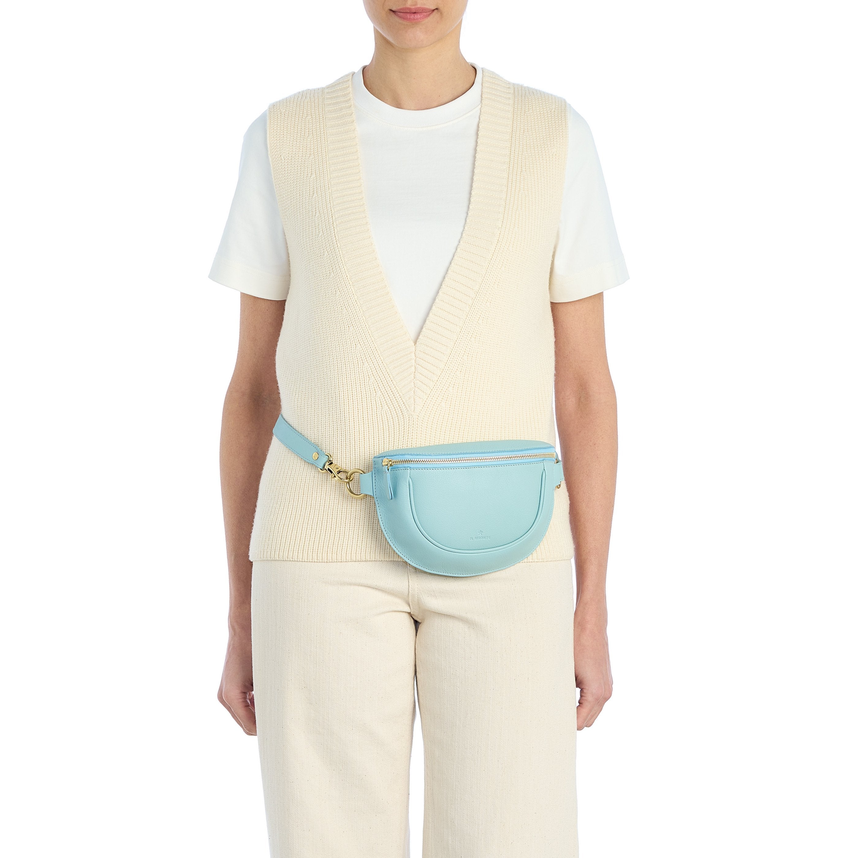 Oliveta | Women's belt bag in leather color sky blue botticelli — 
lifestyle view
 — 2 of 5