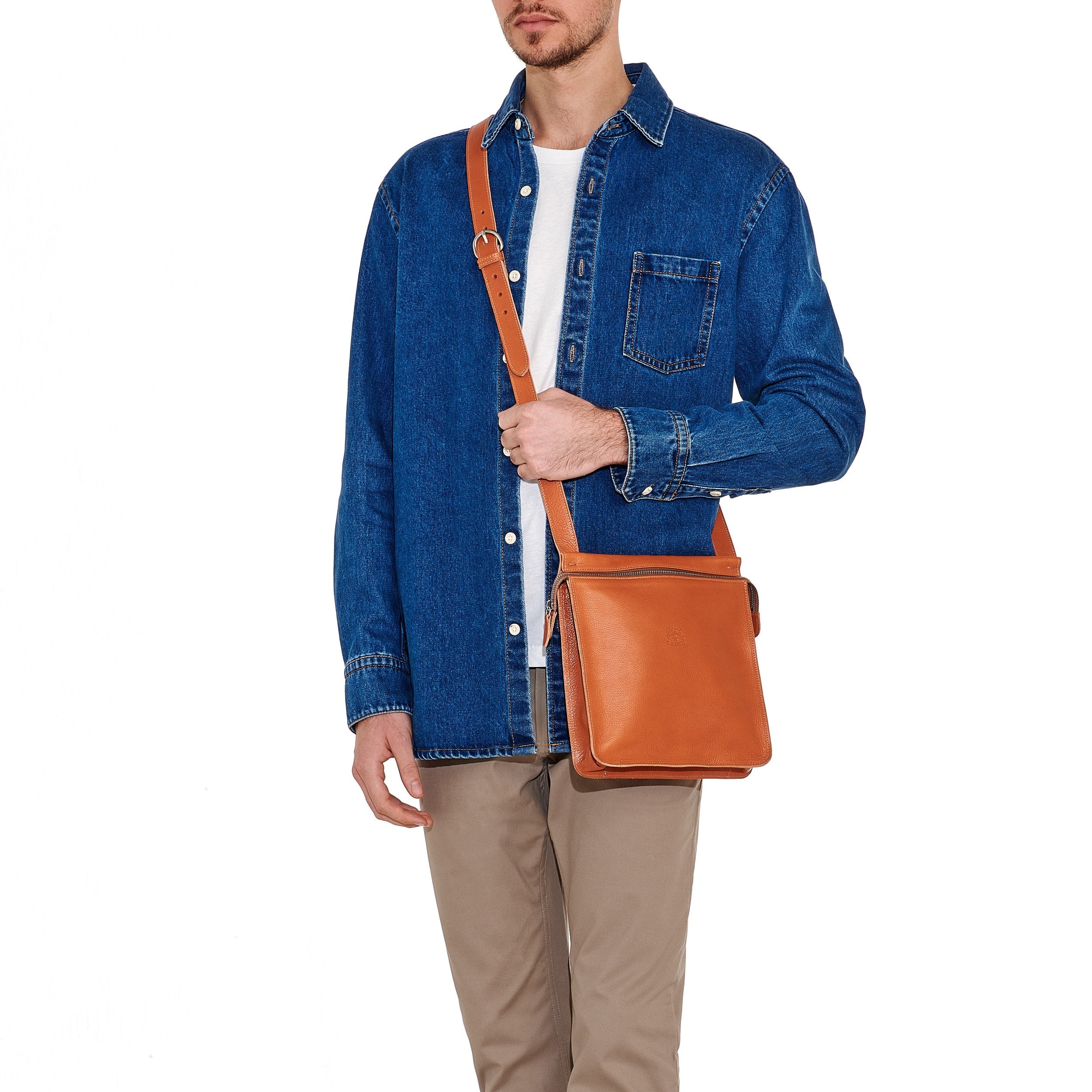 Giuliano | Men's crossbody bag in leather color caramel — 
lifestyle view
 — 2 of 5