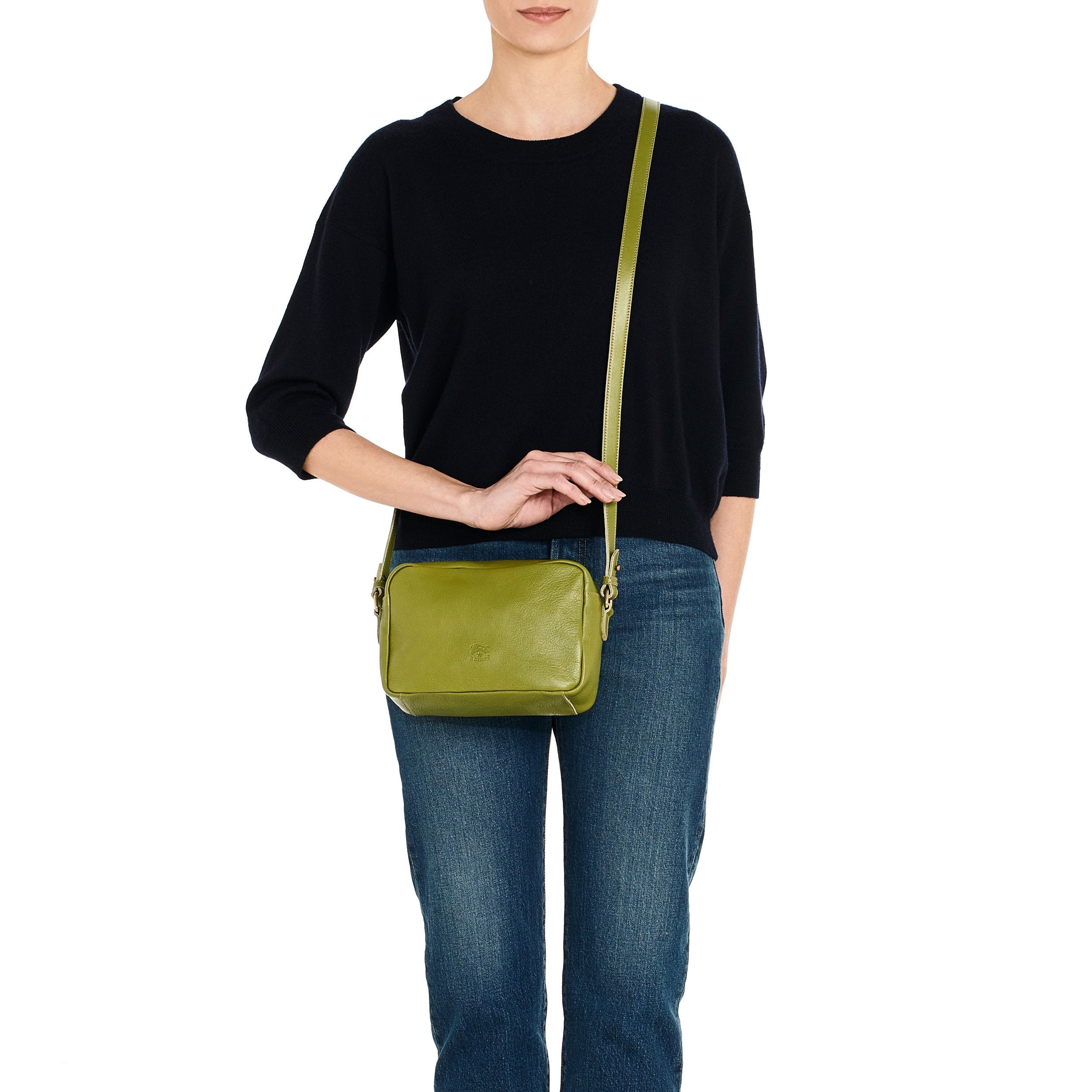 Salina | Women's crossbody bag in leather color seaweed — 
lifestyle view
 — 2 of 4