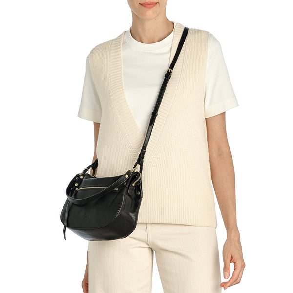 Essenza | Women's crossbody bag in vintage leather — 
lifestyle view
