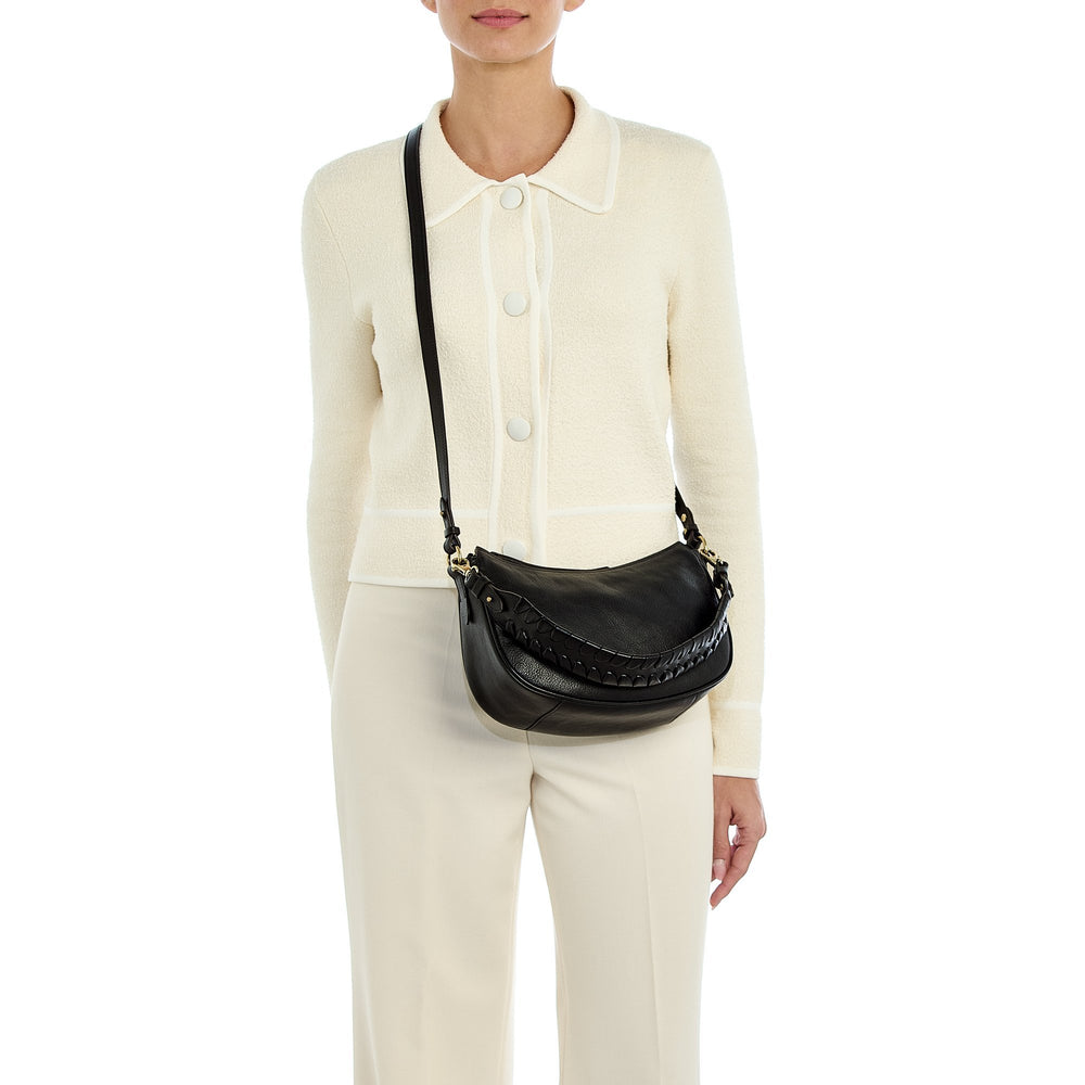 Trama | Women's crossbody bag in leather — 
lifestyle view
 — 2 of 5