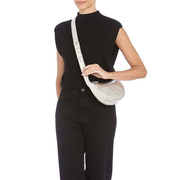 Oliveta | Women's hobo in metallic leather color metallic silver — 
lifestyle view
