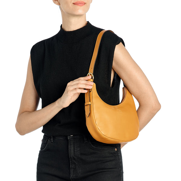 Belcanto | Women's shoulder bag in leather color yellow narciso — 
lifestyle view
