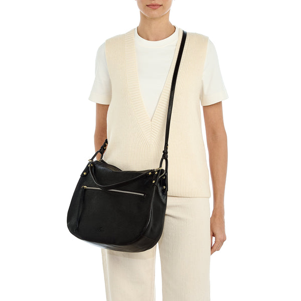 Essenza | Women's shoulder bag in vintage leather — 
lifestyle view
