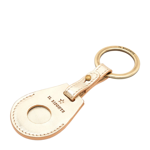 Nina | Women's air tag keyring in metallic leather color metallic platinum — 
side view

