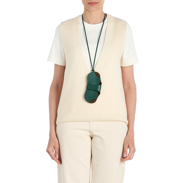Nina | Women's glasses case in leather color green oleandro — 
lifestyle view
