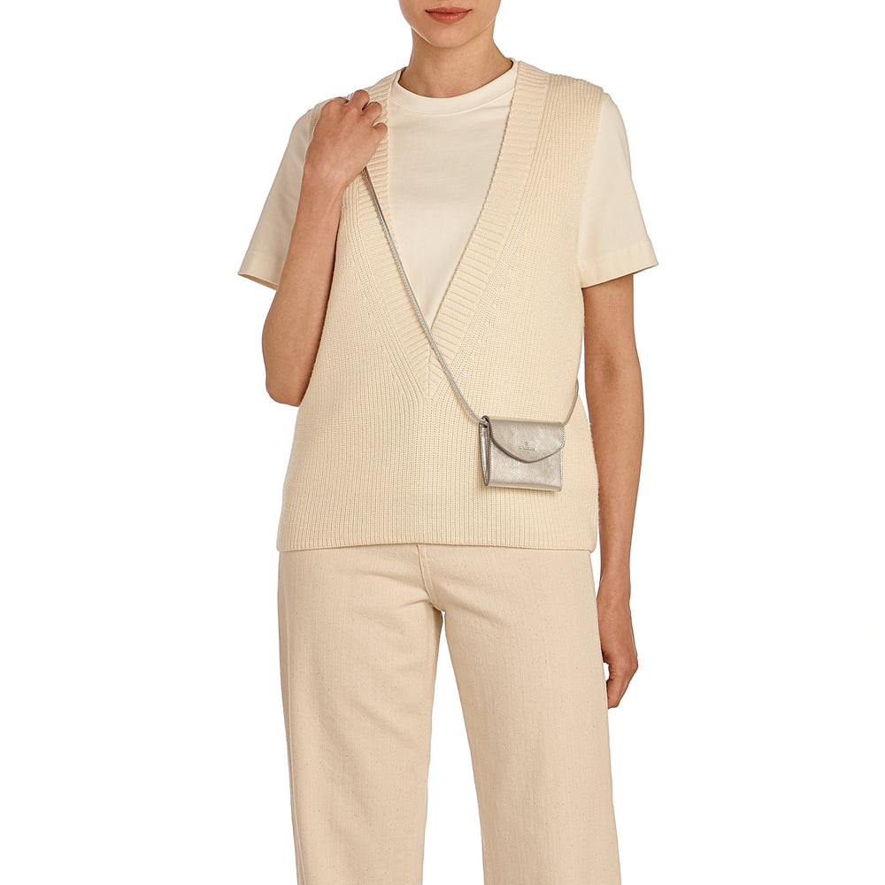 Bigallo | Women's card case in metallic leather color metallic silver — 
lifestyle view
 — 2 of 4